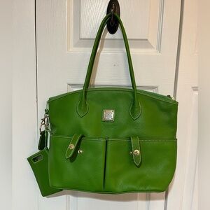 Dooney and Bourke purse. Green. Limited Edition. Extra pockets. NEVER USED.